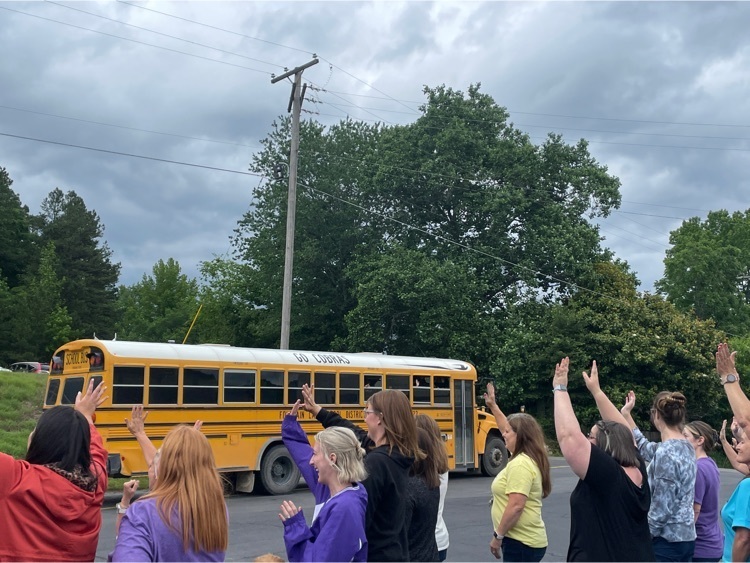 waving to buses