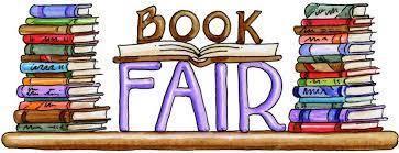 Stacks of books with the words book fair in the middle.